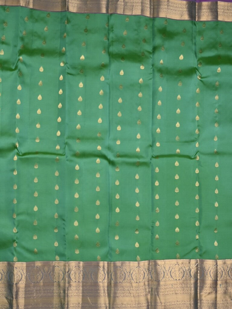 Kanchi pattu saree peacock green color allover zari motifs & kanchi border with rich pallu and contrast plain blouse