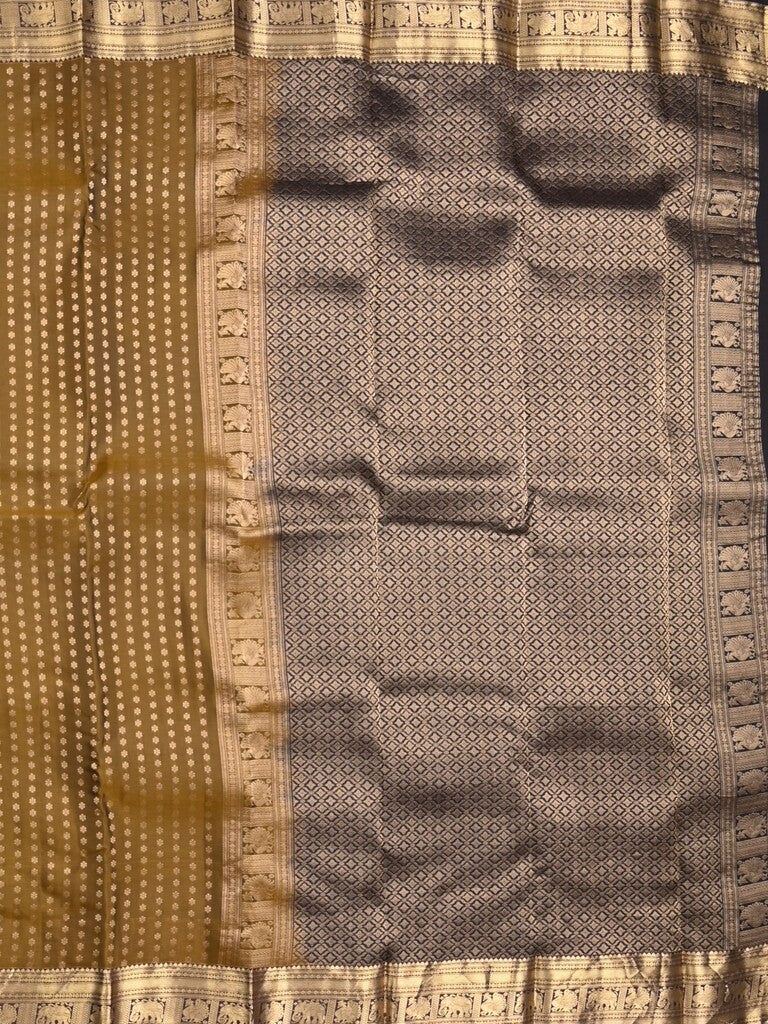 Kanchi pattu saree brown color allover zari motifs & zari border with rich pallu and contrast plain blouse