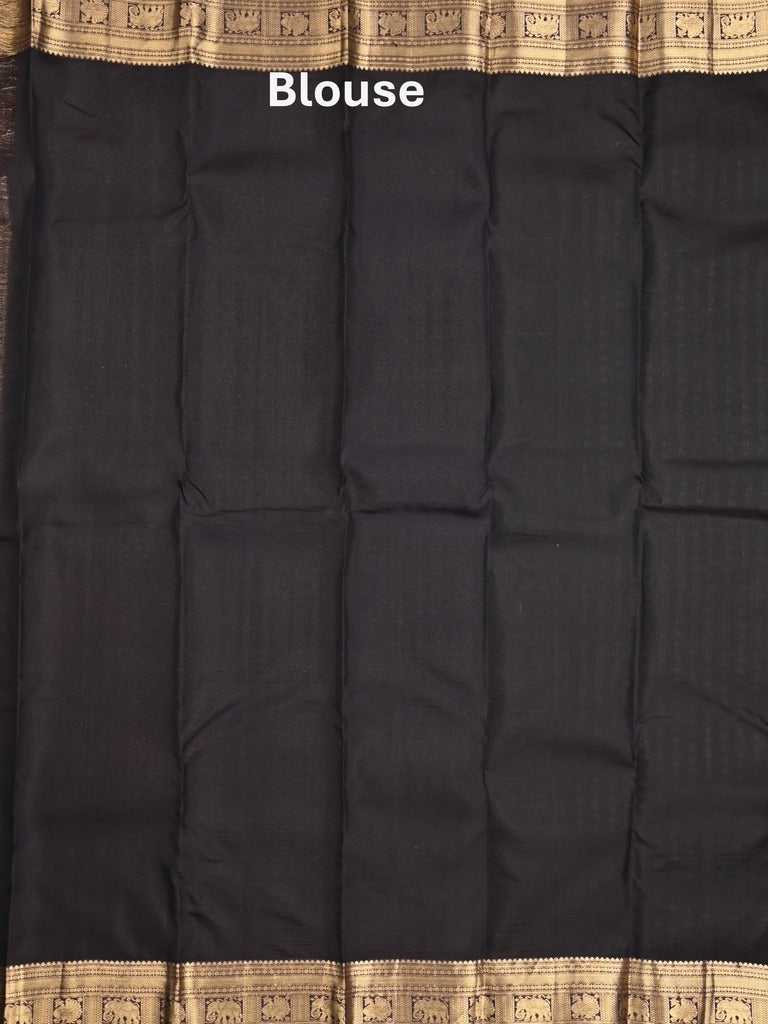 Kanchi pattu saree bottle green color allover zari motifs & zari border with rich pallu and contrast plain blouse