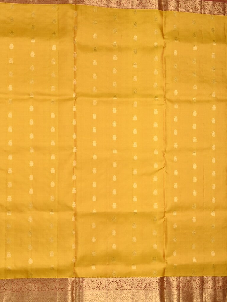 Kanchi pattu saree golden yellow color allover zari motifs & zari border with rich pallu and contrast plain blouse