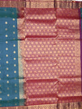Kanchi pattu saree peacock blue color allover zari motifs & zari border with rich pallu and contrast plain blouse