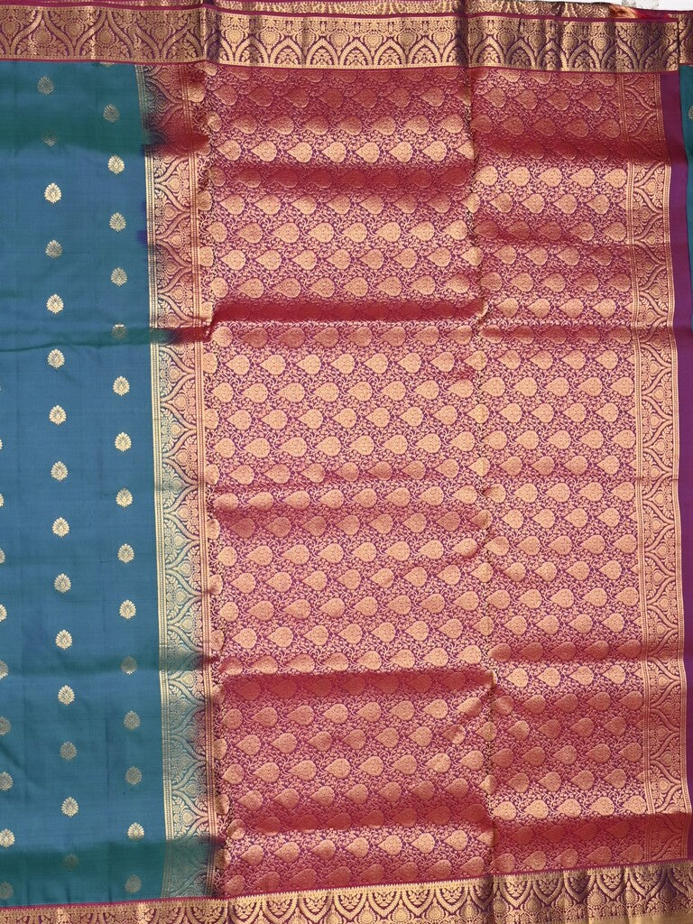Kanchi pattu saree peacock blue color allover zari motifs & zari border with rich pallu and contrast plain blouse