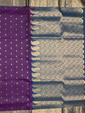 Kanchi pattu saree dark purple color allover zari motifs & zari border with rich pallu and contrast plain blouse