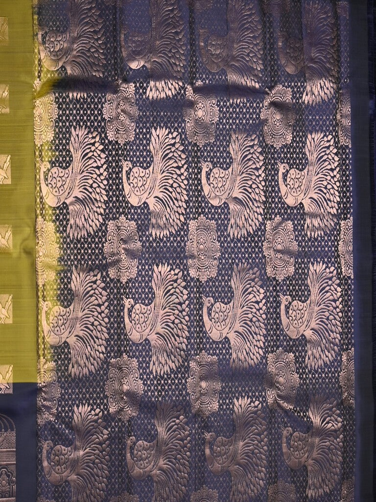 Kanchi pattu saree snuff color allover zari motifs & zari border with rich pallu and contrast plain blouse