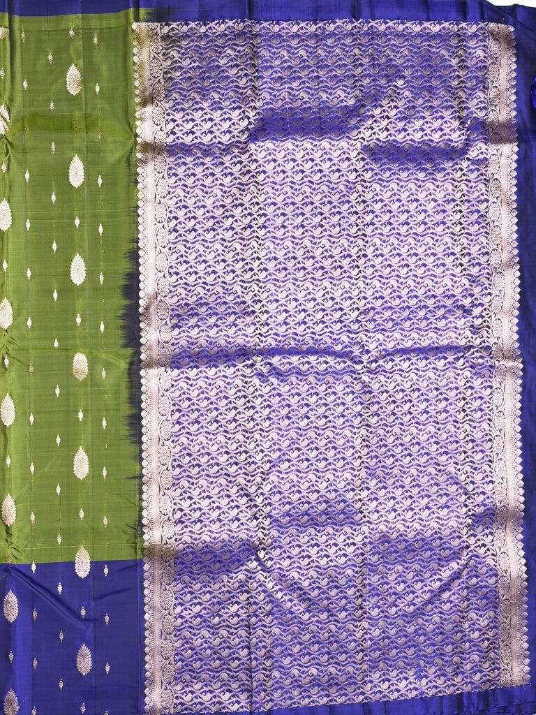 Kanchi pattu saree parrot green color allover zari motifs & zari border with rich pallu and contrast plain blouse