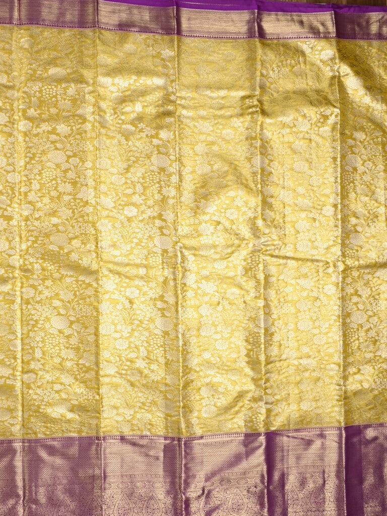 Kanchi pattu saree light yellow color allover zari weaves & kanchi border with rich pallu and contrast blouse