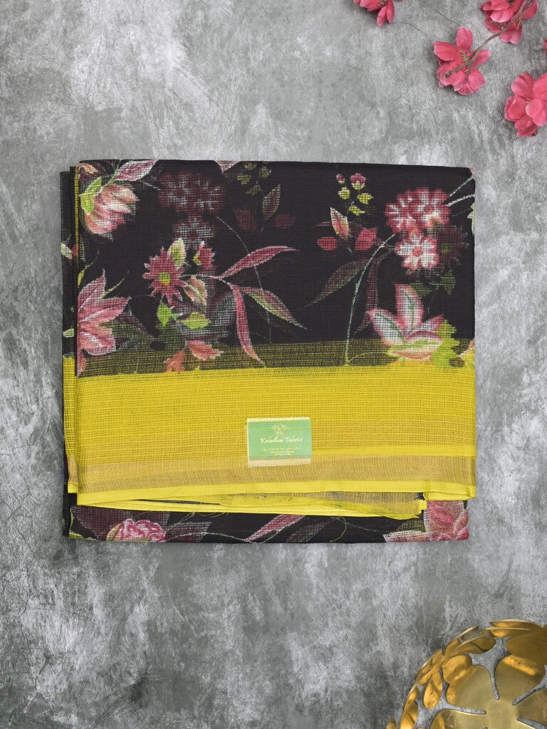 Kota fancy fancy saree black color allover prints & zari border with printed pallu and contrast plain blouse