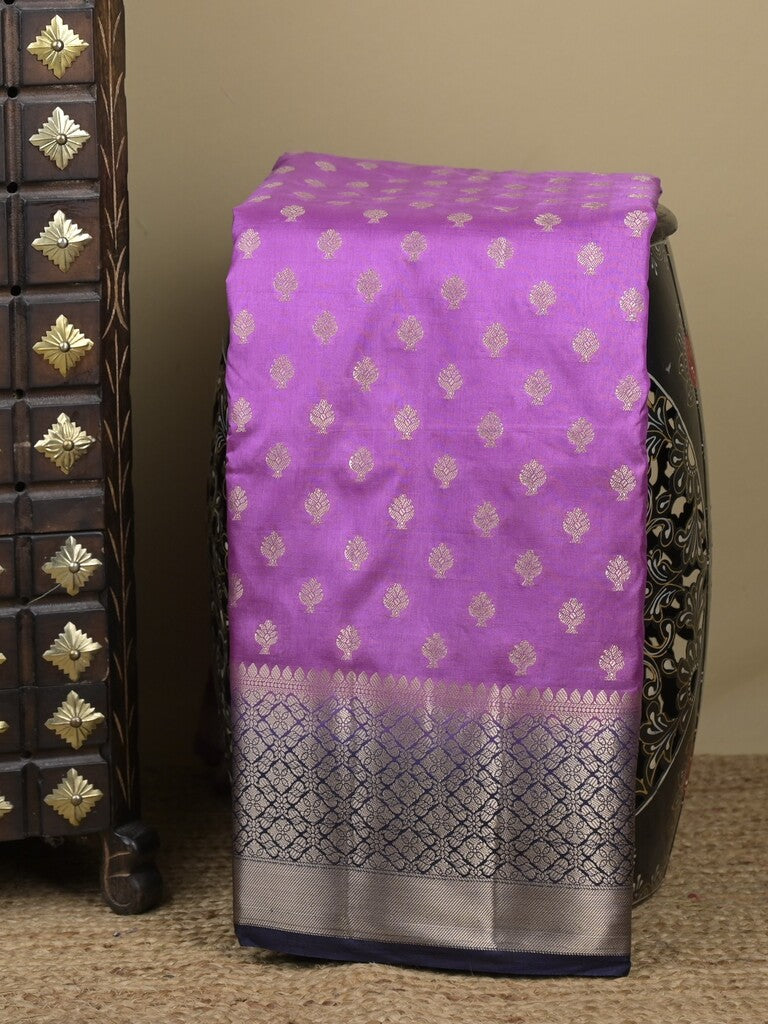 Dupion fancy saree in purple color allover zari motifs & zari border with zari pallu and contrast blouse