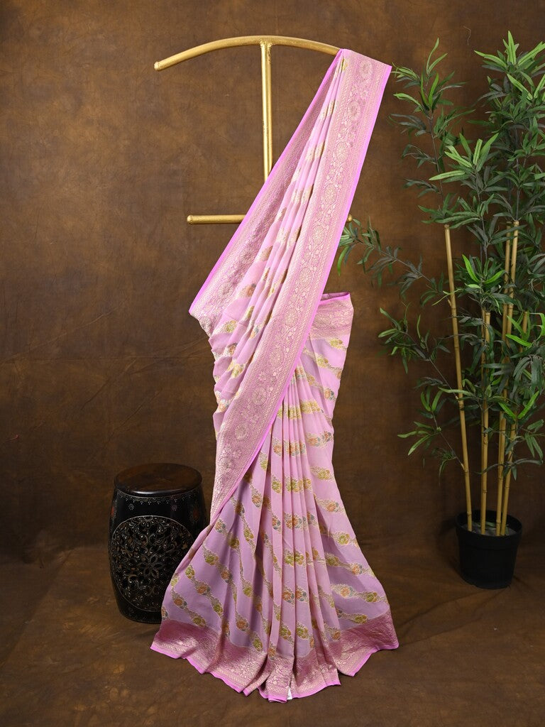 Pure georgette fancy saree light pink color allover zari motifs & zari border with rich pallu and plain blouse