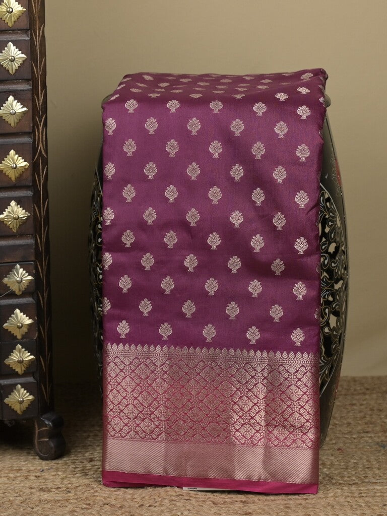 Dupion fancy saree in wine color allover zari motifs & zari border with zari pallu and contrast blouse