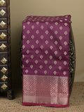 Dupion fancy saree in wine color allover zari motifs & zari border with zari pallu and contrast blouse