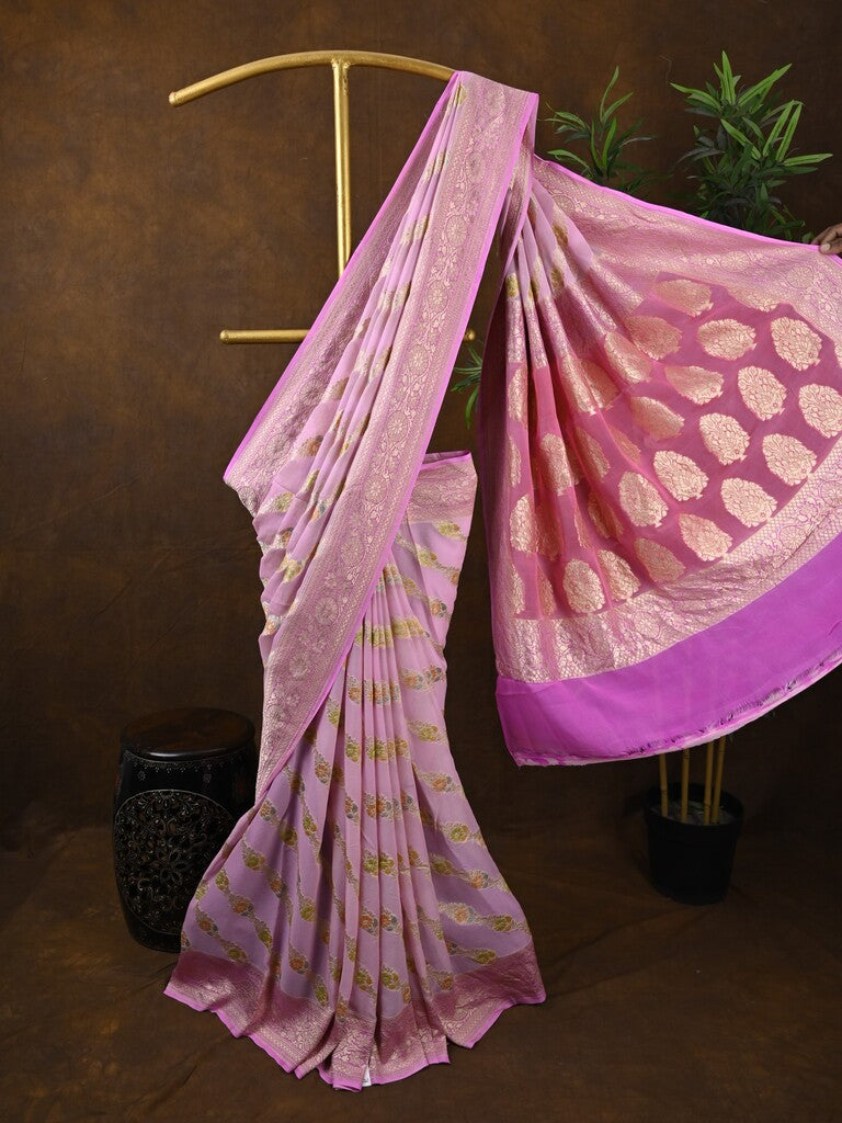 Pure georgette fancy saree light pink color allover zari motifs & zari border with rich pallu and plain blouse