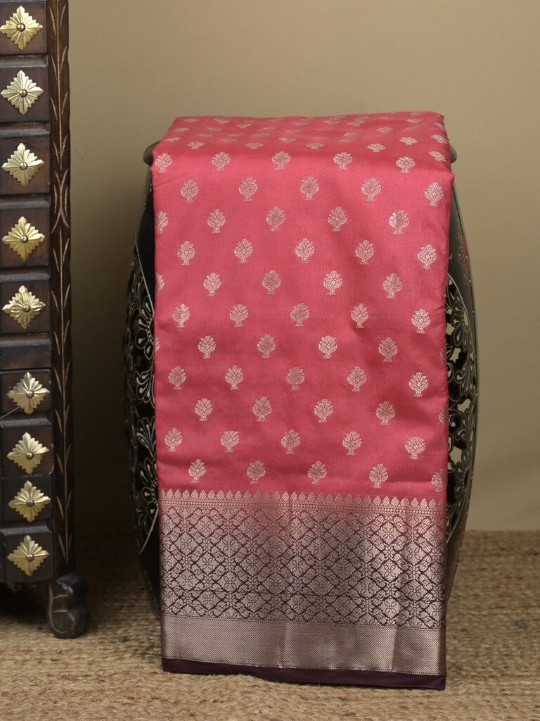 Dupion fancy saree in pink color allover zari motifs & zari border with zari pallu and contrast blouse