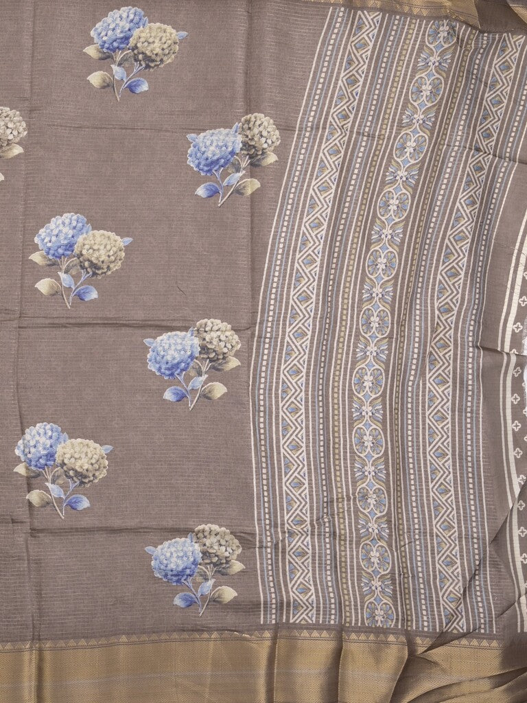 Dola silk fancy saree grey color allover prints & zari border with short pallu and printed self blouse