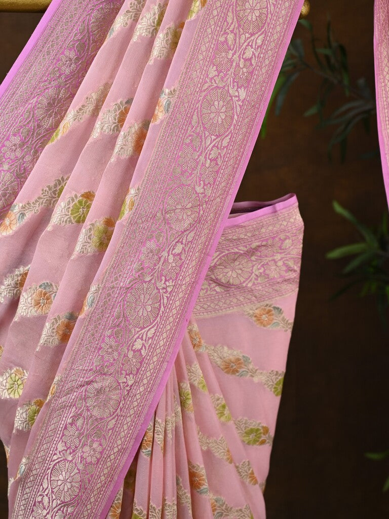 Pure georgette fancy saree baby pink color allover zari motifs & zari border with rich pallu and plain blouse