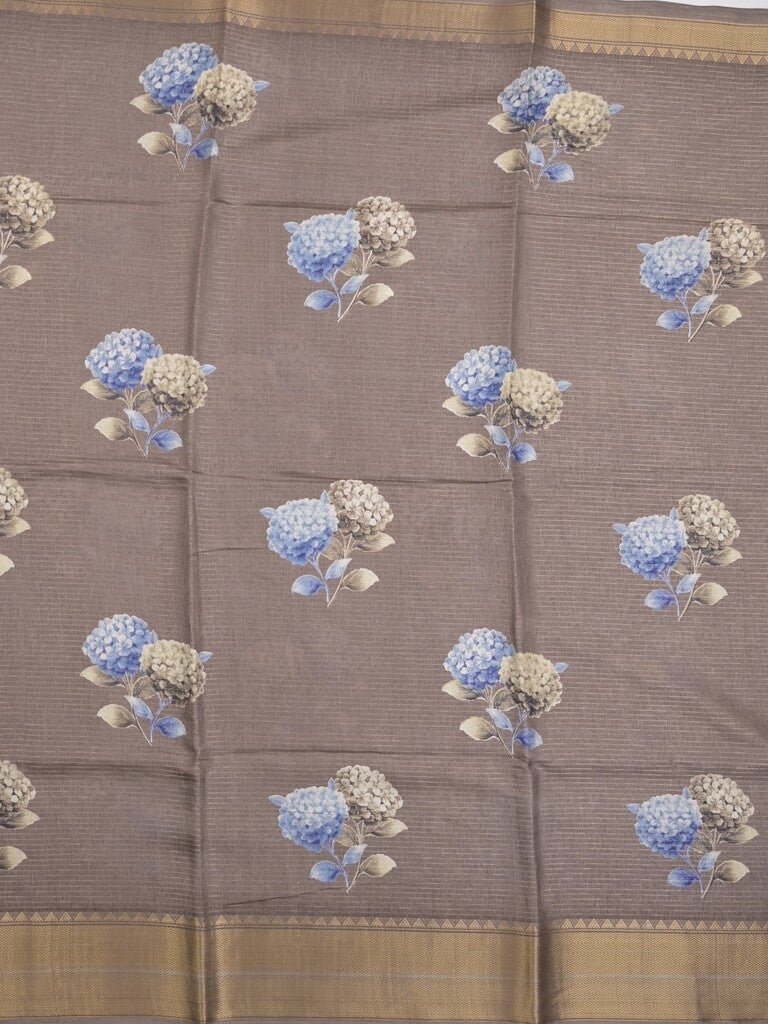 Dola silk fancy saree grey color allover prints & zari border with short pallu and printed self blouse