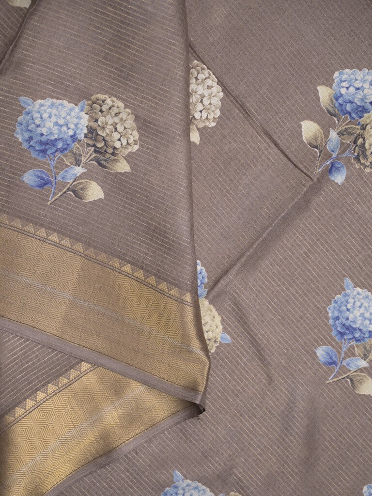Dola silk fancy saree grey color allover prints & zari border with short pallu and printed self blouse