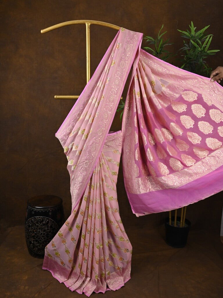 Pure georgette fancy saree baby pink color allover zari motifs & zari border with rich pallu and plain blouse