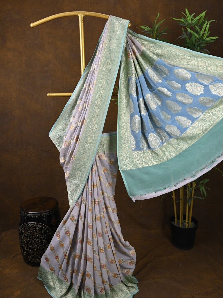 Pure georgette fancy saree pastel purple color allover zari motifs & zari border with rich pallu and plain blouse