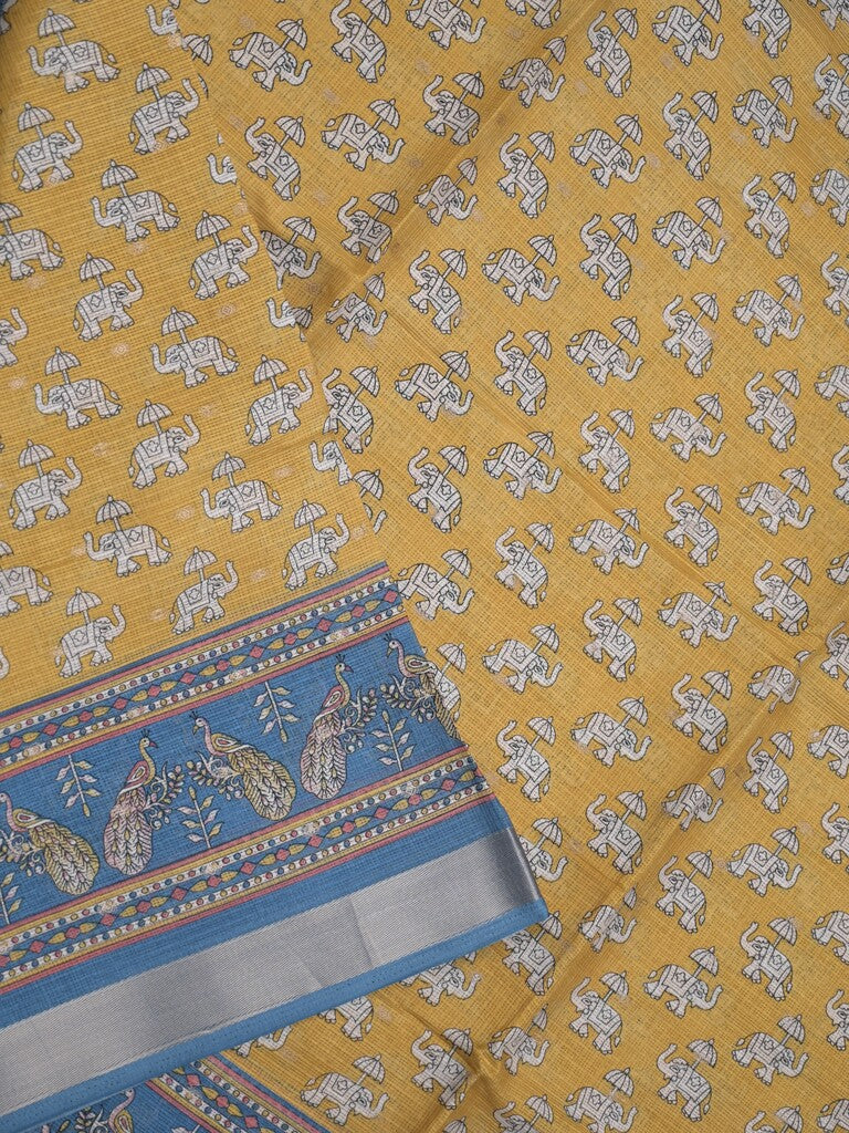 Kota fancy fancy saree light yellow color allover prints & zari border with printed pallu and contrast plain blouse