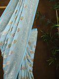 Pure georgette fancy saree light blue color allover zari motifs & zari border with rich pallu and plain blouse