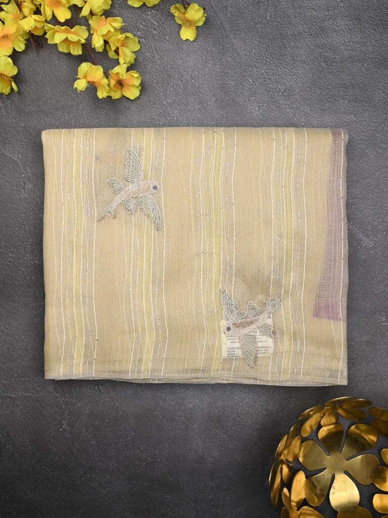 Jute tissue fancy saree pastel yellow color allover sequence work with short pallu and contrast blouse