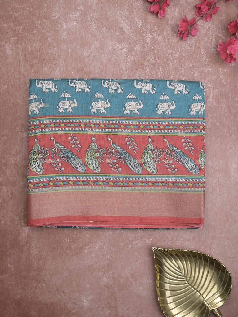 Dola silk fancy saree peacock blue color allover prints & zari border with printed pallu and contrast blouse