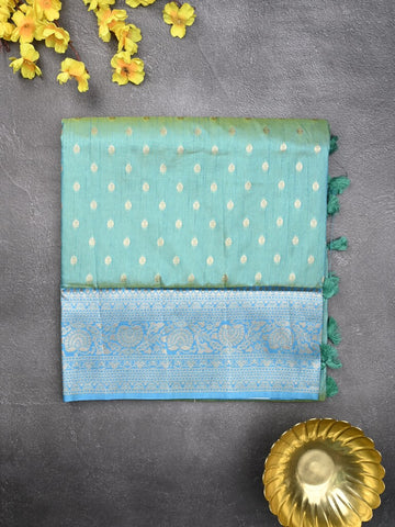 Dupion fancy saree sky blue color allover zari motifs & zari border with rich pallu and plain blouse