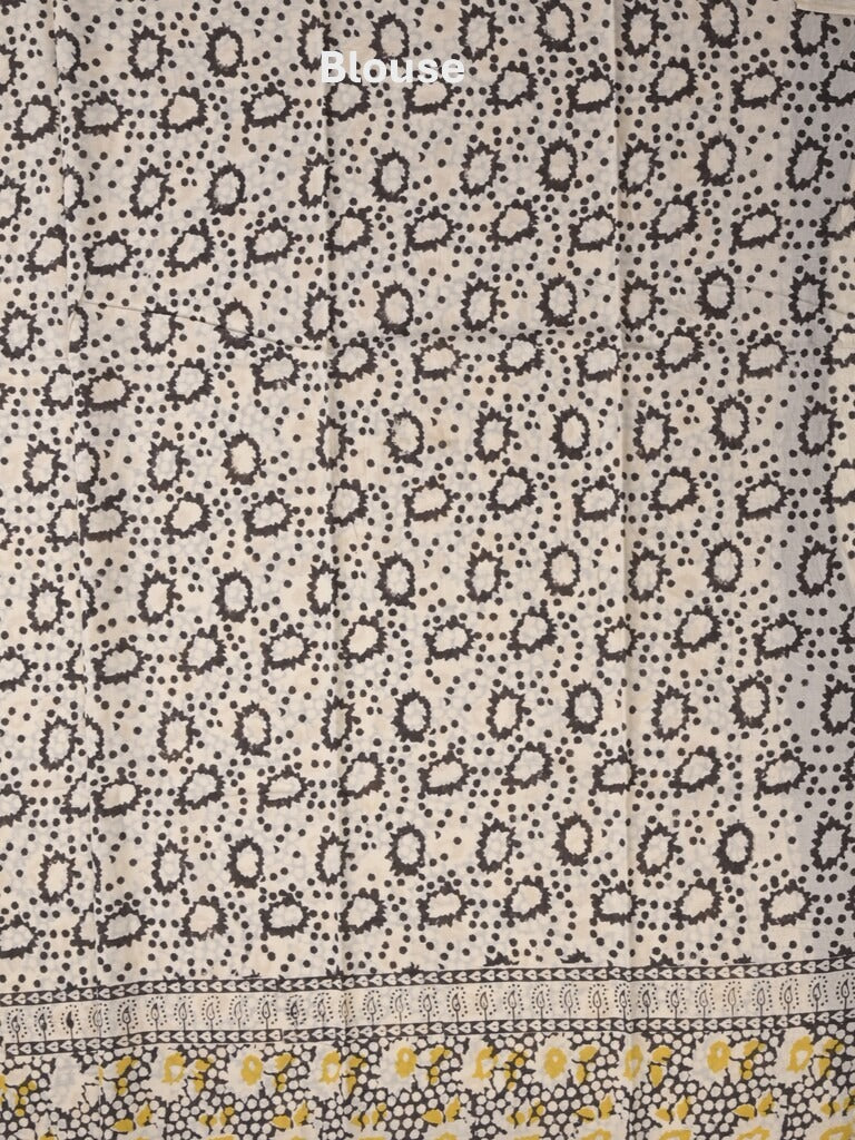 Maheswari fancy saree in white color with pallu and attached printed blouse