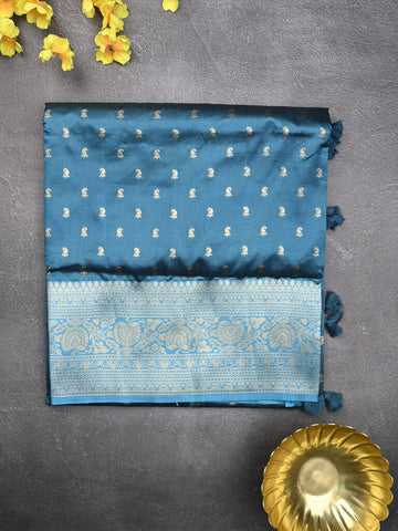 Dupion fancy saree peacock blue color allover zari motifs & zari border with rich pallu and plain blouse