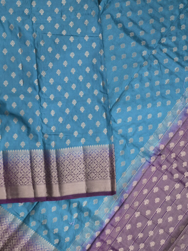 Dupion fancy saree in blue color allover zari motifs & zari border with zari pallu and contrast blouse