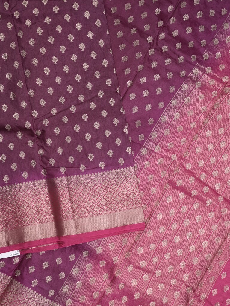 Dupion fancy saree in wine color allover zari motifs & zari border with zari pallu and contrast blouse