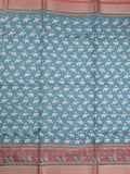 Dola silk fancy saree peacock blue color allover prints & zari border with printed pallu and contrast blouse