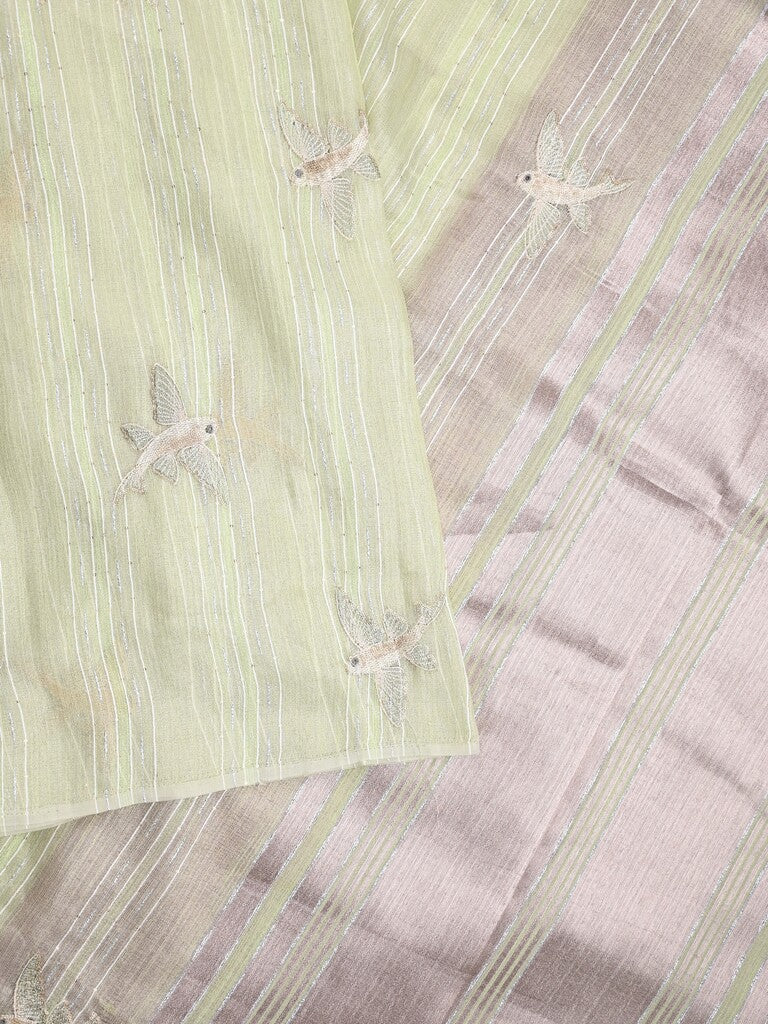 Jute tissue fancy saree light pastel green color allover sequence work with short pallu and contrast blouse