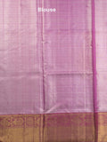 Traditional bridal kanchi tissue pattu saree in cream color with allover rich zari weaves