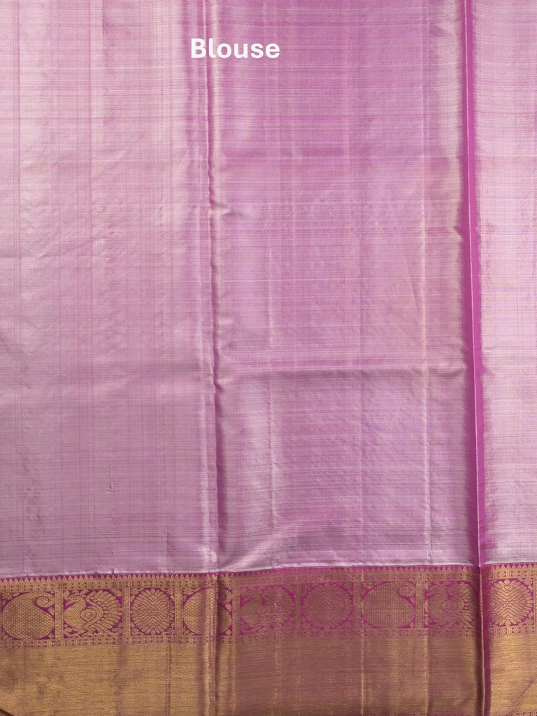 Traditional bridal kanchi tissue pattu saree in cream color with allover rich zari weaves