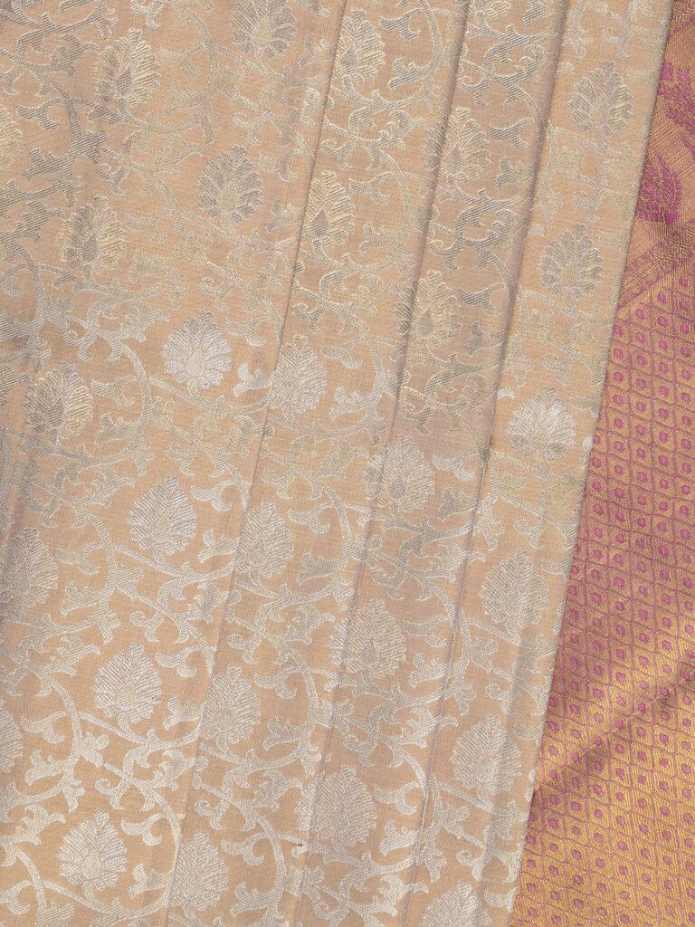Traditional bridal kanchi tissue pattu saree in cream color with allover rich zari weaves