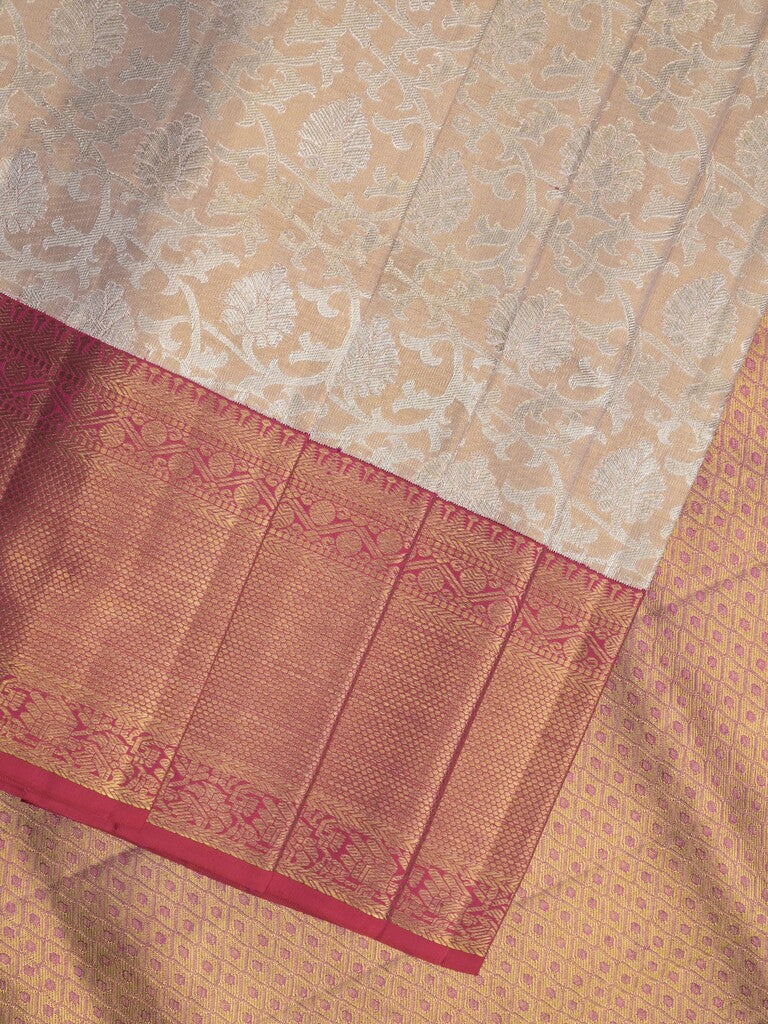 Traditional bridal kanchi tissue pattu saree in cream color with allover rich zari weaves