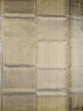 Traditional bridal kanchi tissue pattu saree in cream color with allover rich zari weaves