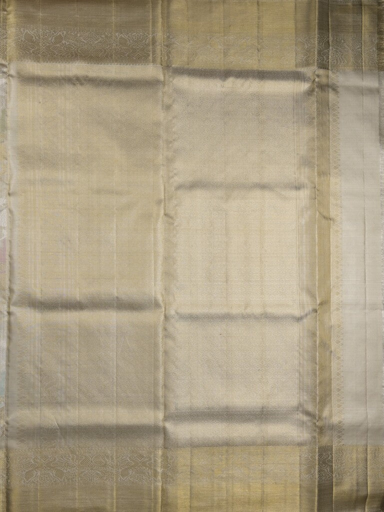 Traditional bridal kanchi tissue pattu saree in cream color with allover rich zari weaves