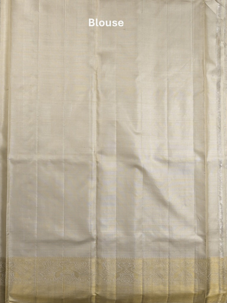 Traditional bridal kanchi tissue pattu saree in cream color with allover rich zari weaves