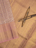 Traditional bridal kanchi tissue pattu saree in peach color with allover rich zari weaves