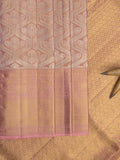 Traditional bridal kanchi tissue pattu saree in peach color with allover rich zari weaves