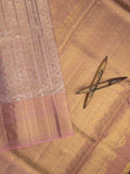 Traditional bridal kanchi tissue pattu saree in peach color with allover rich zari weaves