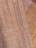 Traditional bridal kanchi tissue pattu saree in peach color with allover rich zari weaves