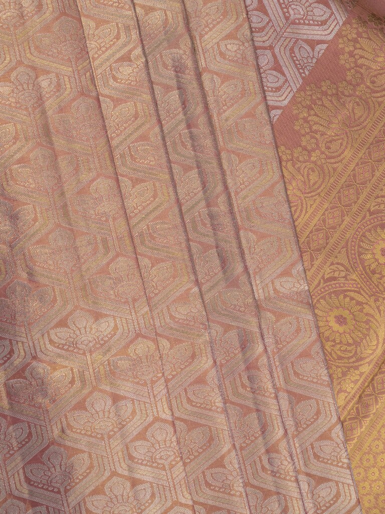 Traditional bridal kanchi tissue pattu saree in peach color with allover rich zari weaves