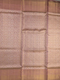 Traditional bridal kanchi tissue pattu saree in peach color with allover rich zari weaves