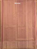 Traditional bridal kanchi tissue pattu saree in peach color with allover rich zari weaves