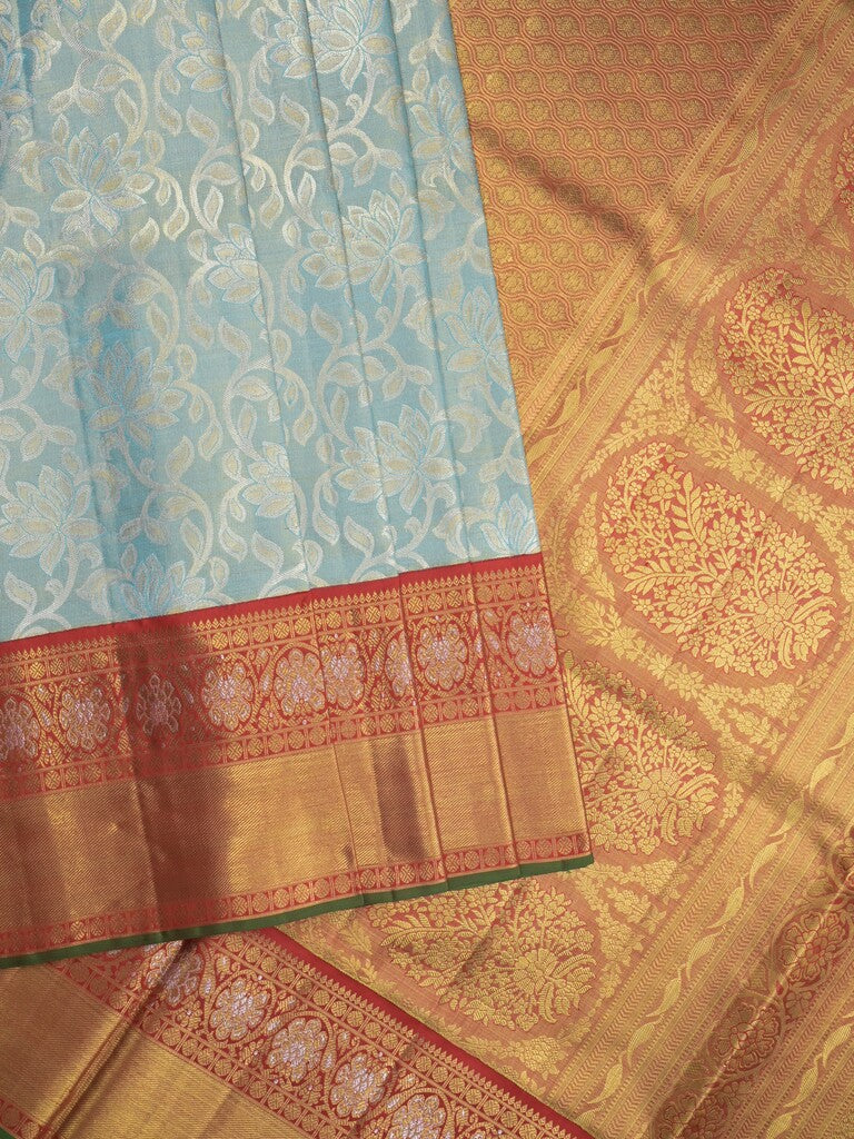 Traditional bridal kanchi tissue pattu saree in blue color with allover rich zari weaves
