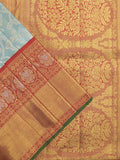 Traditional bridal kanchi tissue pattu saree in blue color with allover rich zari weaves